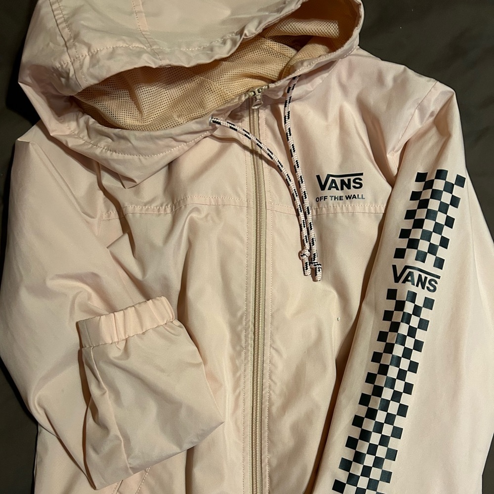 Light pink Vans windbreaker.